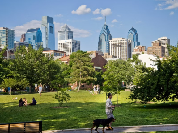 Schuylkill River Park on a sunny day with the skyline in the background